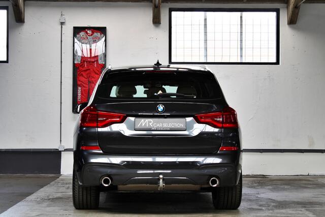 BMW X3 xDrive20i High Executive M Sport | HUD | 21" | Adap. cruise | Trekhaak | Dealer onderhouden