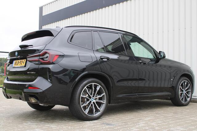 BMW X3 xDrive30e High Executive M-Sport | Incl. 12 maanden garantie | SoH 96% | Panorama dak | Harman/Kardon Audiosysteem | Head-Up Display | Elektrisch verstelbare stoelen met memory | Adaptive cruise | 360° Camera | Elektrische kofferbakklep | Dodehoekdetectie | Stoelverwarming | Keyless entry/start | Navigatie | Parkeersensoren V+A | Apple CarPlay/Android Auto | Climate controle | Draadloze telefoonlader |
