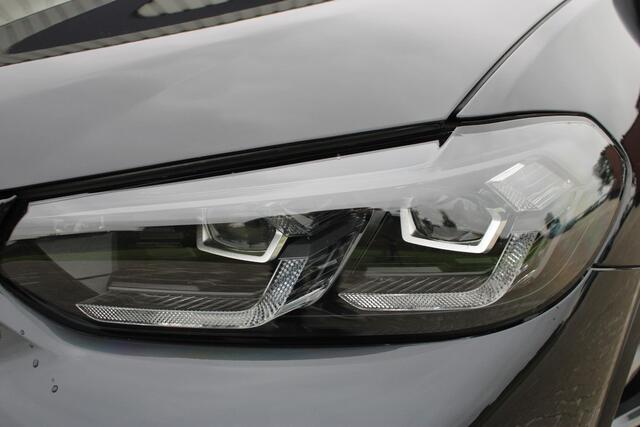 BMW X3 xDrive30e High Executive M-Sport | Incl. 12 maanden garantie | SoH 96% | Panorama dak | Harman/Kardon Audiosysteem | Head-Up Display | Elektrisch verstelbare stoelen met memory | Adaptive cruise | 360° Camera | Elektrische kofferbakklep | Dodehoekdetectie | Stoelverwarming | Keyless entry/start | Navigatie | Parkeersensoren V+A | Apple CarPlay/Android Auto | Climate controle | Draadloze telefoonlader |