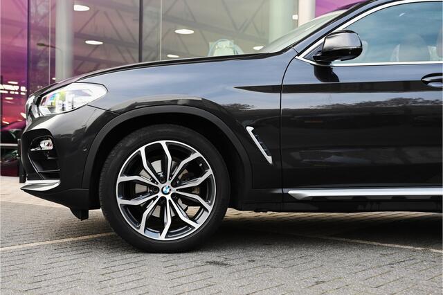 BMW X4 xDrive20i High Executive xLine Automaat / Trekhaak / Panoramadak / Sportstoelen / M Sportonderstel / LED / Parking Assistant Plus / Stoelverwarming / Navigatiesysteem Professional