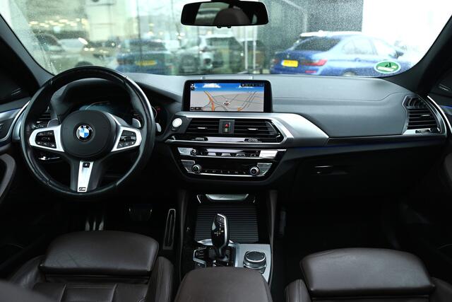 BMW X4 xDrive20i High Executive M Sport Automaat / Panoramadak / Trekhaak / Sportstoelen / Adaptief onderstel / Stuurverwarming / Adaptieve LED / Parking Assistant Plus / Head-Up / Harman Kardon