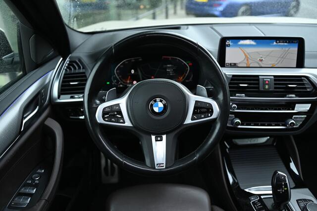 BMW X4 xDrive20i High Executive M Sport Automaat / Panoramadak / Trekhaak / Sportstoelen / Adaptief onderstel / Stuurverwarming / Adaptieve LED / Parking Assistant Plus / Head-Up / Harman Kardon