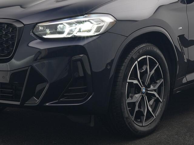 BMW X4 xDrive20i M Sport 184pk Dealer O.H. Carbon Schwarz Metallic | Adaptive Cruise | Camera | Sfeerverlichting | Lederen Sportstoelen Verwarmd | Apple Carplay | Virtual Cockpit | Navigatie | DAB | 19"L.M |