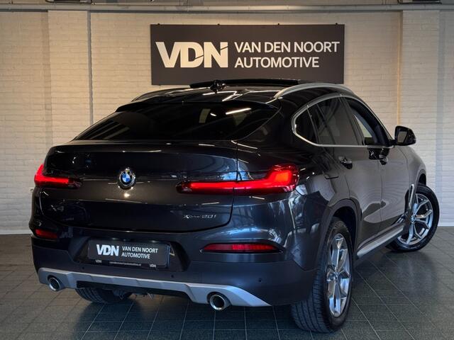 BMW X4 xDrive20i High Executive X-Line Pano Trekhaak HUD Camera 19''