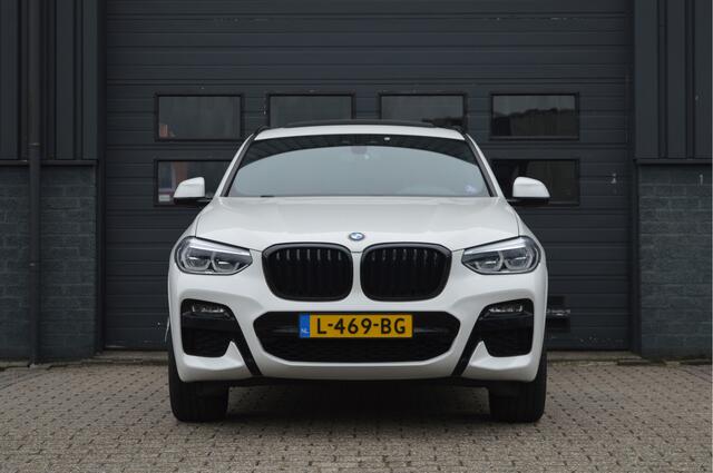 BMW X4 xDrive20i High Executive | M-PAKKET | PANO | TREKHAAK | HUD | HIFI | CAM |