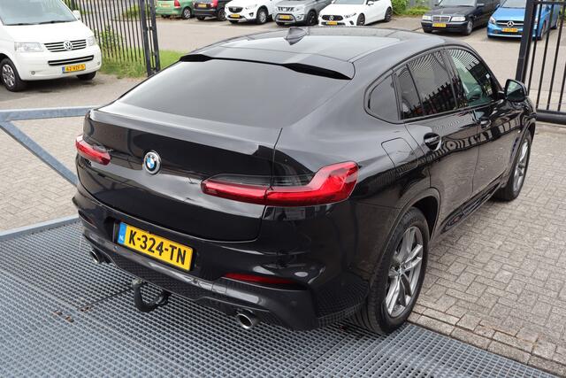 BMW X4 xDrive20i High Executive Apple carplay/Achteruitrijcamera/Intelligent safety/Lederen stoelen/Stoelverwarming/Parkeersensoren/Climate control/Sfeerverlichting