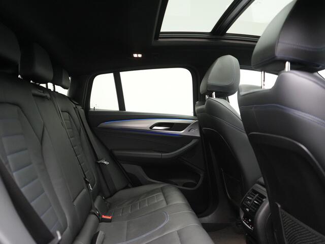 BMW X4 M40i M Sport 354pk | Trekhaak Af Fabriek | Panodak | Head Up | Adaptive Cruise | 360 Camera | Adaptief Onderstel | Lederen Sportstoelen Memory & Verwarmd | 21"L.M | Keyless | Blis | Sfeerverlichting | Apple Carplay |