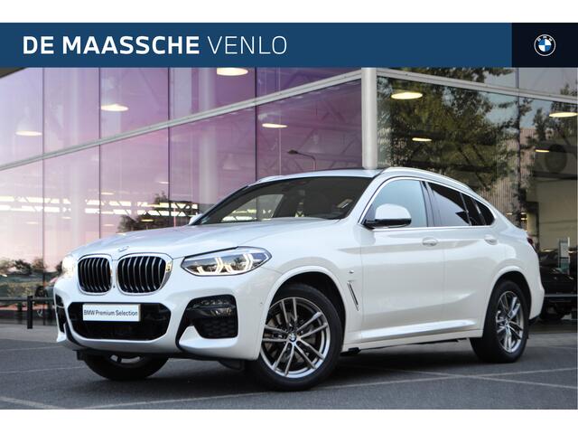 BMW X4 xDrive20i Automaat / Panoramadak / Trekhaak / Sportstoelen / Comfort Access / Head-Up / Active Cruise Control / Adaptieve LED / Parking Assistant Plus