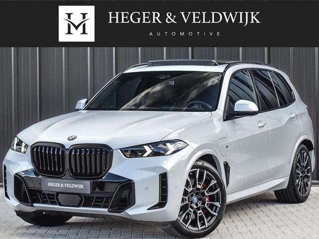 BMW X5 xDrive50e | M-SPORT | PANORAMADAK | LUCHTVERING | DRIVING ASSISTANT | ACTIVE CRUISE | COMFORT ACCESS | ICONIC GLOW | COMFORT SEATS | AMBIANCE INTERIEUR | HARMAN/KARDON | 360 CAMERA | DAB+ |