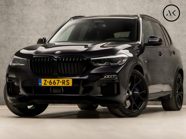 BMW X5 xDrive45e High Executive M Sport 395Pk Automaat (SKYLOUNGE PANORAMADAK, ALCANTARA HEMELBEKLEDING, M PAKKET, LUCHTVERING, APPLE CARPLAY, COMFORT ZETELS, LASER LED, ADAPTIVE CRUISE, HARMAN/KARDON, STUUR/STOELVERWARMING, NIEUWS