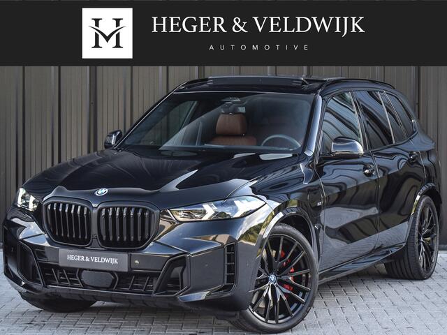 BMW X5 xDrive50e | M-SPORT | ICONIC GLOW | COMFORT ACCESS | CARBON INLEG | SOFT-CLOSE | TREKHAAK | PANORAMADAK | COMFORT SEATS | ADAPTIVE LED | ACTIVE CRUISE | HARMAN/KARDON | ALCANTARA HEMEL | HEAD-UP