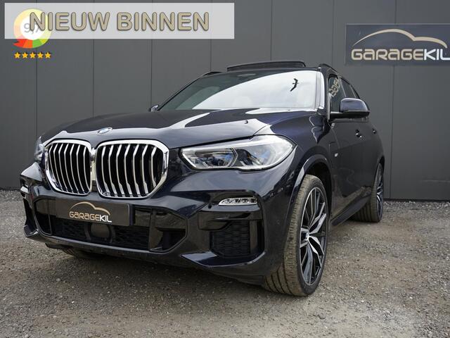 BMW X5 xDrive45e High Executive Dealeronderh. / Individual interieur ivory white night blue / M-sport / 22 inch / Panoramadak / Harman Kardon / Driving prof / Head-up display /