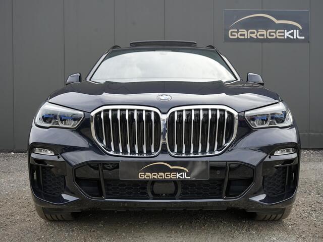 BMW X5 xDrive45e High Executive Dealeronderh. / Individual interieur ivory white night blue / M-sport / 22 inch / Panoramadak / Harman Kardon / Driving prof / Head-up display /