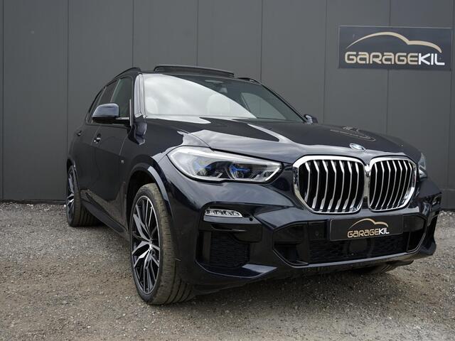 BMW X5 xDrive45e High Executive Dealeronderh. / Individual interieur ivory white night blue / M-sport / 22 inch / Panoramadak / Harman Kardon / Driving prof / Head-up display /