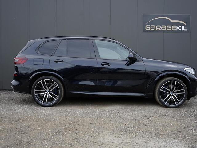 BMW X5 xDrive45e High Executive Dealeronderh. / Individual interieur ivory white night blue / M-sport / 22 inch / Panoramadak / Harman Kardon / Driving prof / Head-up display /