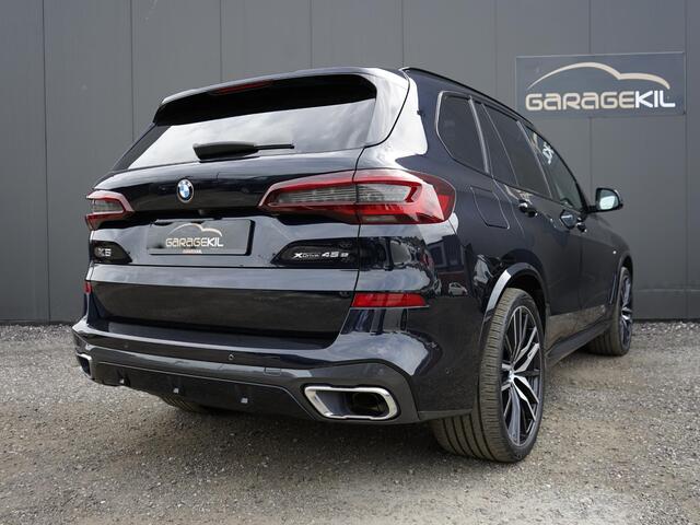 BMW X5 xDrive45e High Executive Dealeronderh. / Individual interieur ivory white night blue / M-sport / 22 inch / Panoramadak / Harman Kardon / Driving prof / Head-up display /