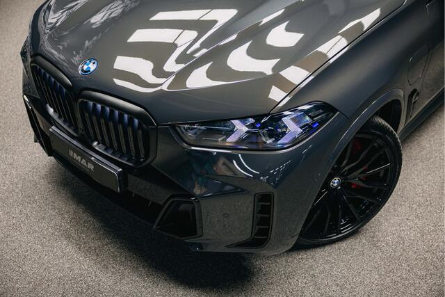 BMW X5 xDrive50e | Luxe stoelen | Luchtvering | Dravit Grau | Trekhaak | Stuur en stoelverwarming | Harman/Kardon |