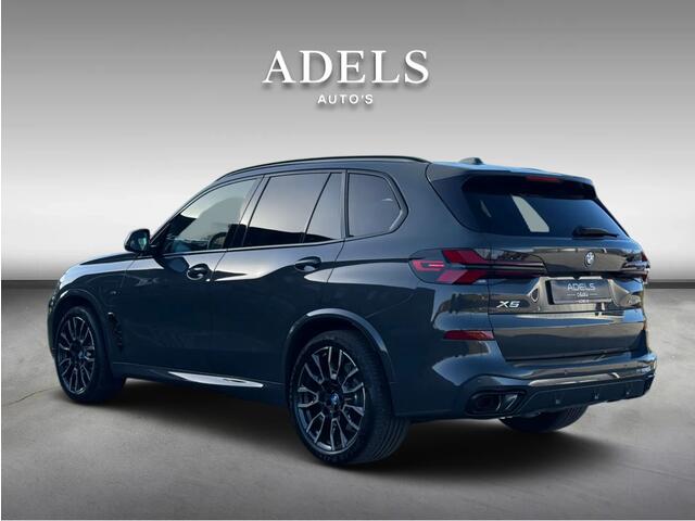 BMW X5 xDrive50e M Sport Pro Dravitgrau Panodak Harman Kardon Carbon Trekhaak Dealer Onderhouden