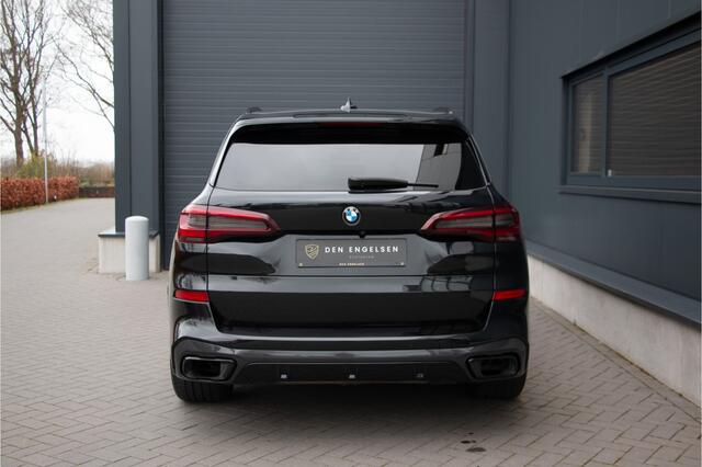 BMW X5 xDrive 45 e | M-Sport | ACC | Skylounge | Massage & Ventilatie | Comfortstoelen | Lane + Side Assist | Pano | Stuurverwarming | Harman Kardon | Camera | 21" | Apple & Android Carplay | Memory | Laser | Dealer Onderhoud | BTW | Luchtvering | 360 Cam | Carb