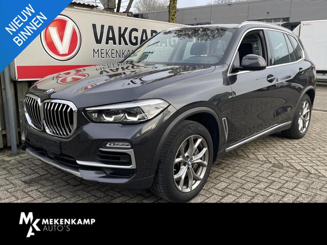 BMW X5 xDrive45e High Executive 19''/Trekhaak/Harman Kardon/Keyless/Head-up/Adaptieve cruise/Dodehoek/Stuur + stoelverwarming v+a/Luchtvering/Leder + memory
