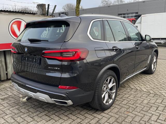 BMW X5 xDrive45e High Executive 19''/Trekhaak/Harman Kardon/Keyless/Head-up/Adaptieve cruise/Dodehoek/Stuur + stoelverwarming v+a/Luchtvering/Leder + memory