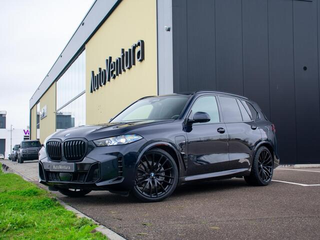 BMW X5 xDrive50e | Trekhaak | M Sport | Achteras besturing | Schuif-/kantel Pano | Softclose | Adapt. LED | Head-up | Stuurwielverwarming