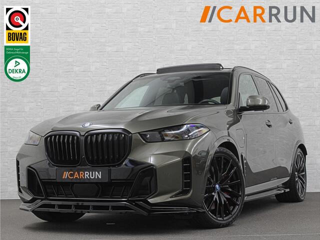 BMW X5 50e M-Sport Pro | Panorama | 360 Camera | ACC | Carbon | Individual Leder | Trekhaak | Head-Up | Keyless-Entry | Harman-Kardon | Stoelverwarming V+A | Memory | Stuurverwarming | 22 inch | Iconic-Glow | M-Gordels | ISO-Glas | Zonwering | Beker Clima | Stan