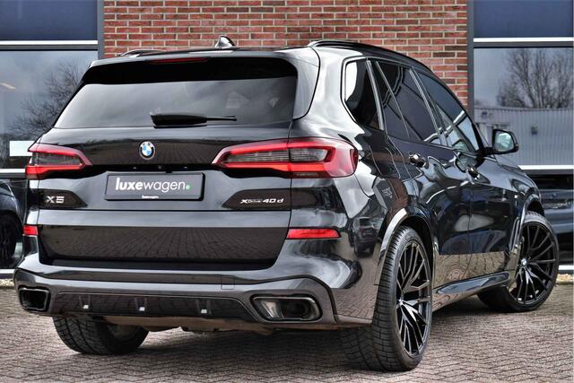 BMW X5 xDrive45e M-Sport SkyLounge M-zetels 4WS ACC Trekh 360 2xTV Carbon HUD
