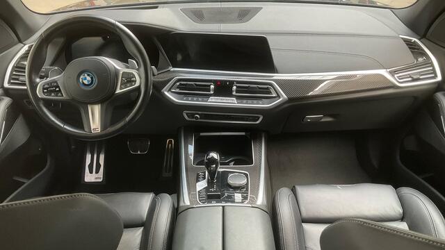 BMW X5 xDrive45e M-Sport SkyLounge M-zetels 4WS ACC Trekh 360 2xTV Carbon HUD