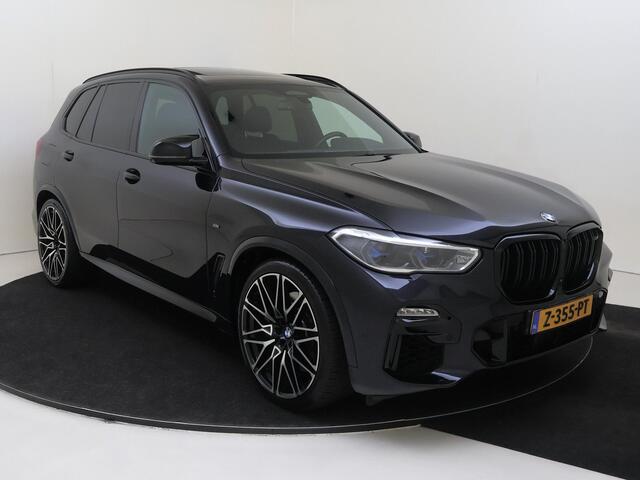BMW X5 M50i High Executive 531 PK | airco automatisch | Apple Carplay/Android | cruise control | lederen bekleding | lichtmetalen velgen multi-spaaks 21"| M Aerodynamica | navigatiesysteem full map + hard disk