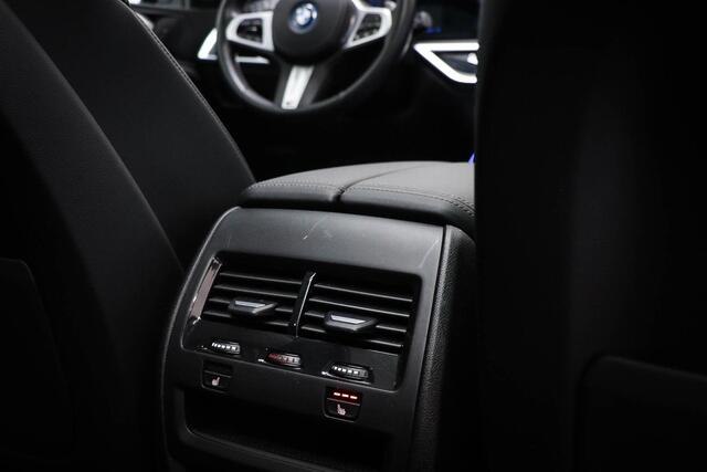 BMW X5 xDrive50e M-Sport | PANORAMADAK | HEAD UP | HOUTAFWERKING | ACHTERBANKVERWARMING | TREKHAAK | 360 CAMERA | 21"