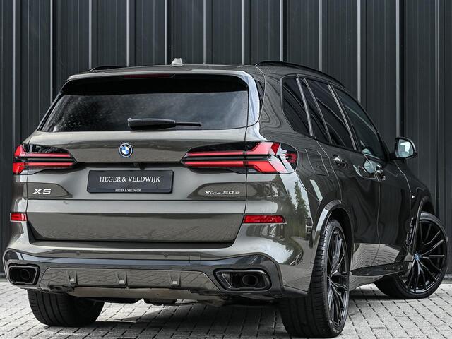 BMW X5 xDrive50e M-Sport Pro | Panoramadak | Achterasbesturing | Massage + Ventilatie | Sky Lounge | 360 Camera | Active Cruise | Harman/Kardon | Iconic Glow | BMW Gesture Control | HUD | Soft Close | Luchtvering | Trekhaak |