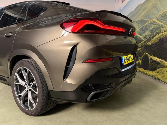 BMW X6 xDrive40i High Executive Sky Lounge l M-pakket l Scherm achterin