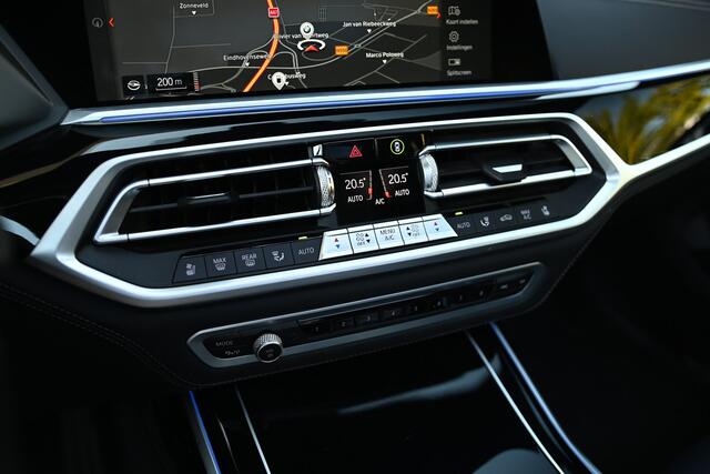 BMW X7 M50i 6p. High Executive Automaat / Panoramadak Sky Lounge / Massagefunctie / Laserlight / Parking Assistant Plus / Soft Close / Stoelventilatie / Active Steering