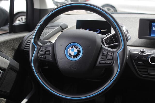BMW i3 Basis 120Ah 42 kWh / Camera / Navigatie / 19'' / Harman Kardon / Stoelverwarming / Cruise Control / Warmtepomp / Getint glas