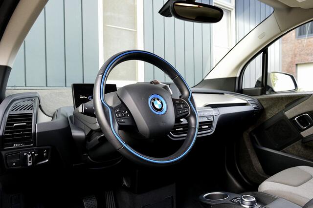 BMW i3 Basis iPerformance 94Ah 33 kWh Rijklaarprijs-Garantie Navigatie Airco warmte pomp Camera 90% SOH