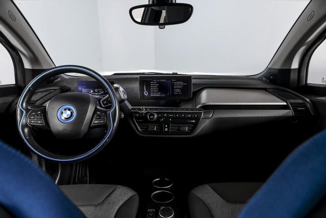 BMW i3 Basis 94Ah 33 kWh | S/k-panodak | Harman/Kardon | Dig. Cockpit | Adapt. cruise | Stoelverw. | PDC | Camera | NAV | ECC | LM 20" |