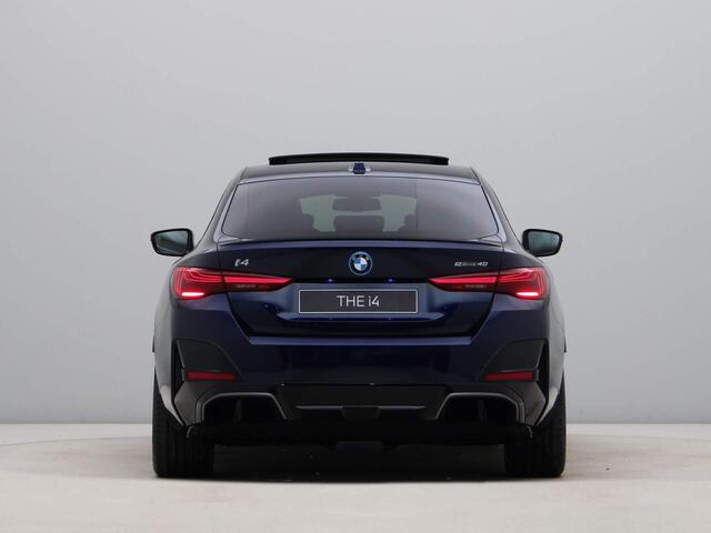 BMW i4 eDrive40 84 kWh | M-Sport Pro | Tartufo Interieur | Driving Assistant Professional | Carbon Inleg |