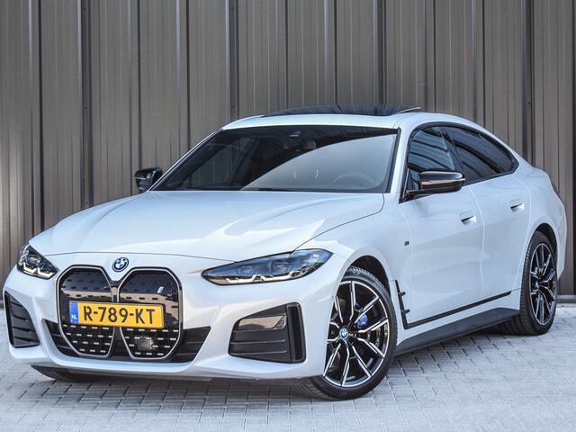 BMW i4 eDrive40 High EXECUTIVE 84 kWh | M-SPORT | SCHUIFDAK | SHADOW-LINE | NL- AUTO | CAMERA | HEAD-UP | TREKHAAK | MEMORY SEATS | AMBIANCE INTERIEUR |