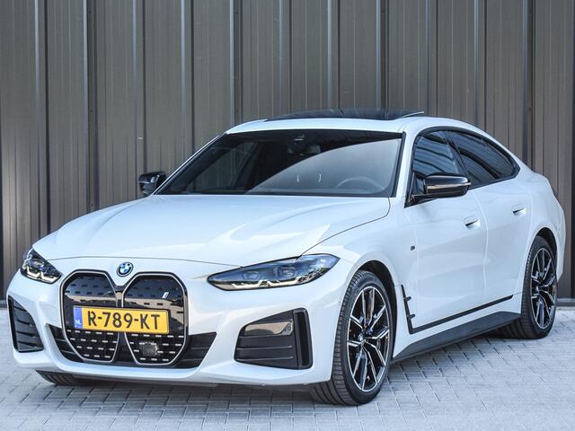 BMW i4 eDrive40 High EXECUTIVE 84 kWh | M-SPORT | SCHUIFDAK | SHADOW-LINE | NL- AUTO | CAMERA | HEAD-UP | TREKHAAK | MEMORY SEATS | AMBIANCE INTERIEUR |