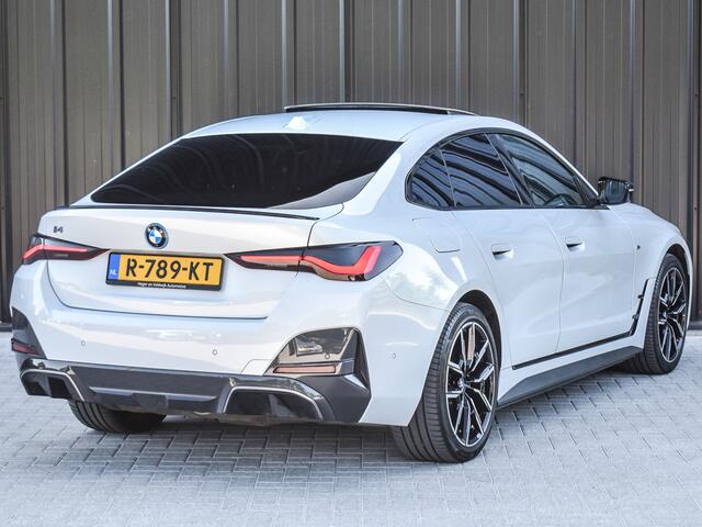 BMW i4 eDrive40 High EXECUTIVE 84 kWh | M-SPORT | SCHUIFDAK | SHADOW-LINE | NL- AUTO | CAMERA | HEAD-UP | TREKHAAK | MEMORY SEATS | AMBIANCE INTERIEUR |