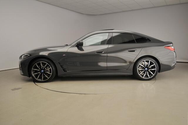 BMW i4 Gran Coupe eDrive40 | M-Sportpakket | LED | Leder | HUD | Schuifdak | Trekhaak | Elektr. zetels | DAB | Harman-kardon sound | Alu 19 inch