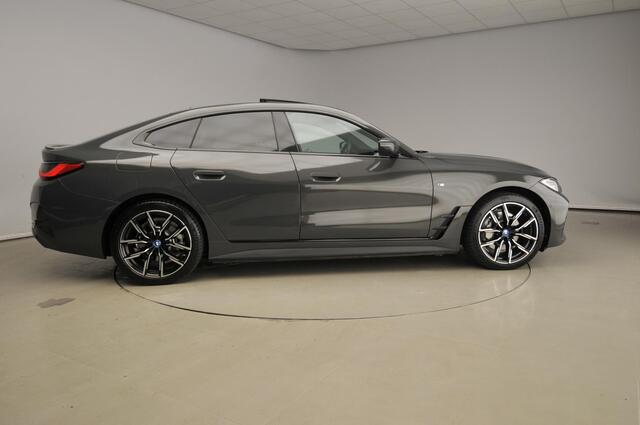 BMW i4 Gran Coupe eDrive40 | M-Sportpakket | LED | Leder | HUD | Schuifdak | Trekhaak | Elektr. zetels | DAB | Harman-kardon sound | Alu 19 inch