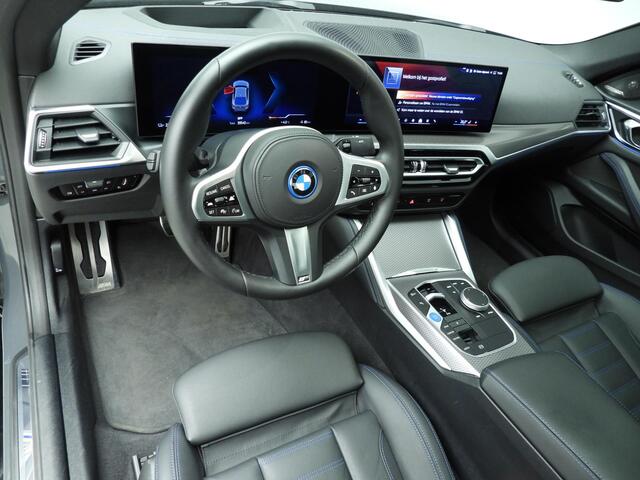 BMW i4 Gran Coupe eDrive40 | M-Sportpakket | LED | Leder | HUD | Schuifdak | Trekhaak | Elektr. zetels | DAB | Harman-kardon sound | Alu 19 inch