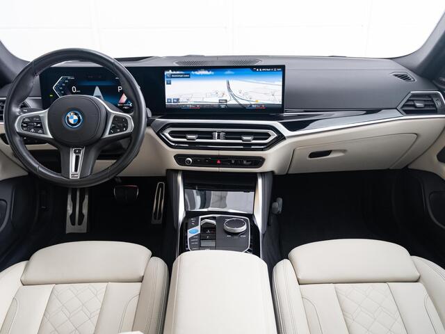 BMW i4 M50 | High Executive | M Sportpakket Pro | Verwarmd Stuurwiel | Comfort Access | Schuif-/kanteldak | Harman Kardon | Parking Assistant Plus