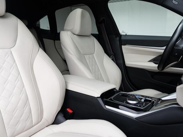 BMW i4 M50 | High Executive | M Sportpakket Pro | Verwarmd Stuurwiel | Comfort Access | Schuif-/kanteldak | Harman Kardon | Parking Assistant Plus