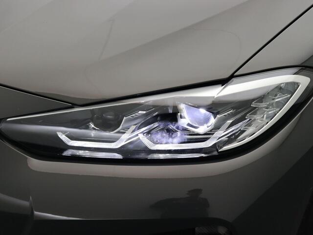 BMW i4 M50 High Executive | M Sportpakket | Comfort Access | Trekhaak | Schuifdak | Elektrisch Verstelbare M Sportstoelen | Active Cruise Control | Harman Kardon | 19''
