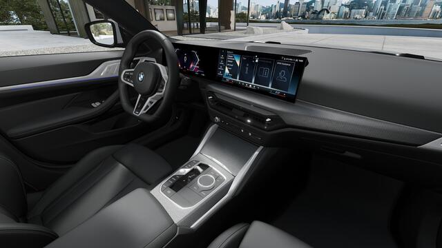 BMW i4 eDrive35 Gran Coupé M Sport / Achteruitrijcamera / Adaptieve LED / Active Cruise Control / Stoelverwarming / Live Cockpit Plus