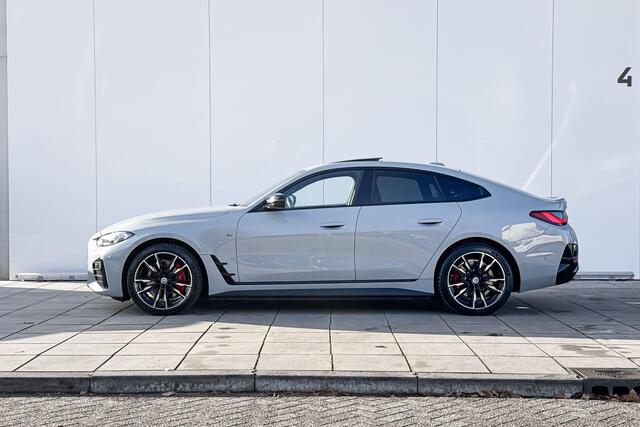 BMW i4 M50 High Executive M-Sport Pro 19 Inch / Electrische Zwenkhaak / Glazen Schuifdak / Getinte Ramen Achter / Binnen & Buitenspiegel Automatisch Dimmend / Electrisch Verstelbare Voorstoelen / Active Cruise Control / Driving Assistant / Laser Light / Harman K