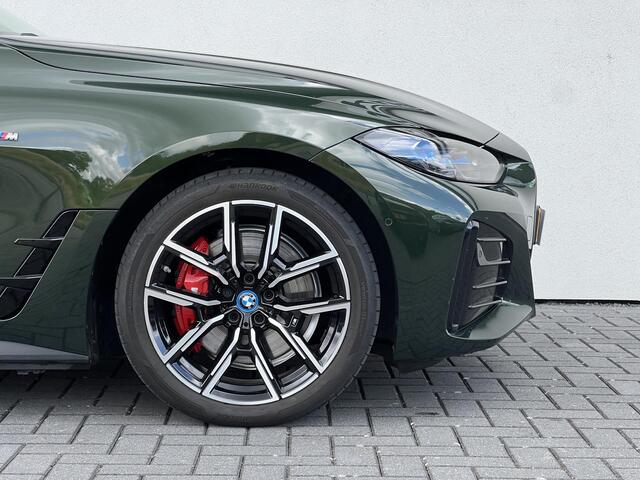 BMW i4 M50 High Executive 84 kWh Sport Pro | High Executive | Glazen schuif-/kanteldak | Stuur- en stoelverwarming | Trekhaak | Comfort Access | Laserlight | Harman Kardon | Head-Up